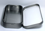 Flip tin inside with insert for Child resistant cannabis edibles and pre roll tins. 