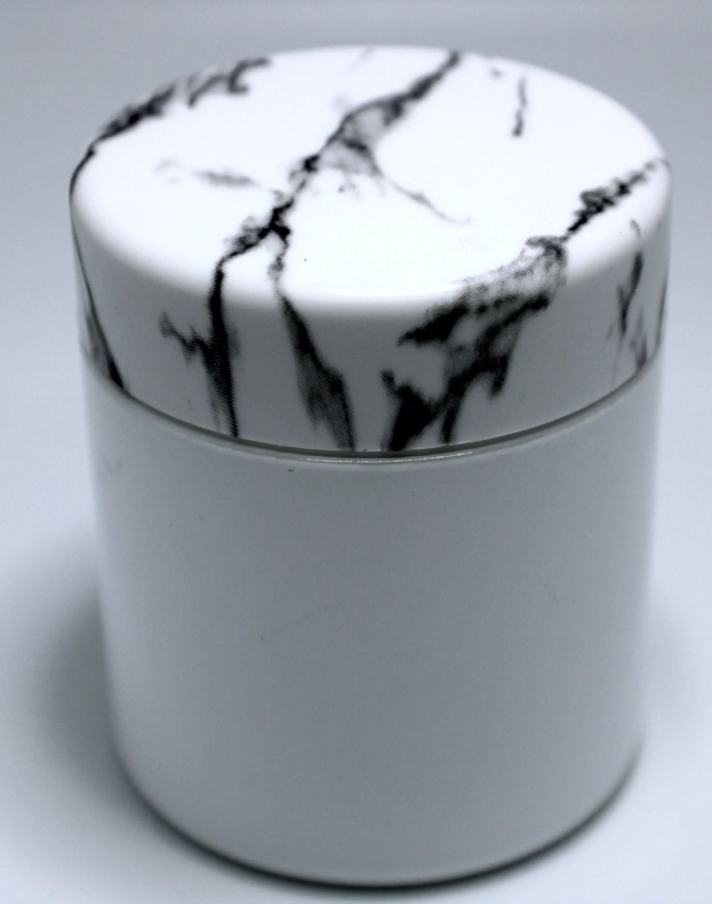 black and white marble lid with white jar for cannabis flower or edibles