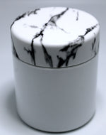 black and white marble lid and white jar for cannabis flower jars